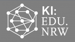 Graphik mit einem Netzdiagramm und dem Text KI: EDU. NRW auf grauem Hintergrund.